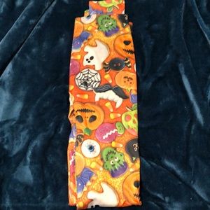 Never worn Halloween leggings suze one in woman’s comfy